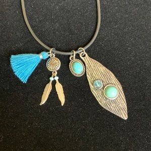 NWOT Boho style necklace. Black nylon cord 24 inches.